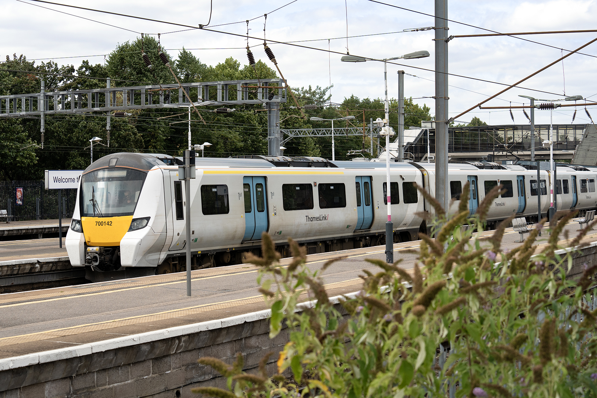 Train pulling into platform at Bedford station